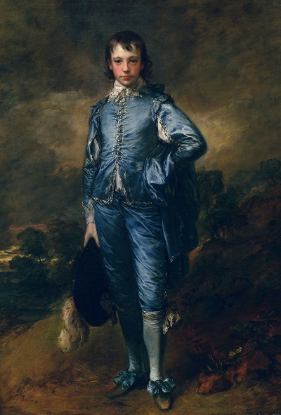 A boy looking out at the viewer wearing a fancy blue circa 17th century outfit