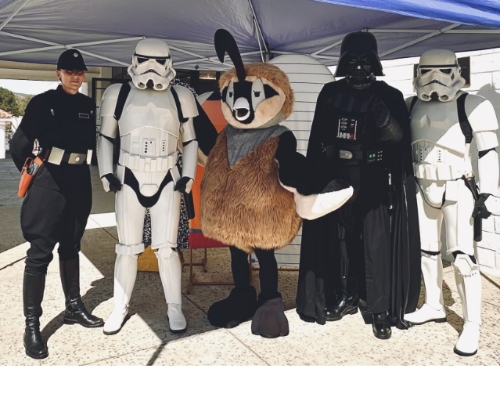 Costumed Quincy the Quail poses with Darth Vader, Commander Dedra Meero, and a couple of Stormtroopers at the Back to School Extravaganza